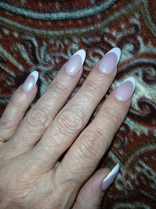 https://cdn.salonspotlight.com/photos/1ipcvlnEPDdLPQftwtEp/5fa2592e-d6d5-4f82-a68a-cd4c0b4d04c7_720x720