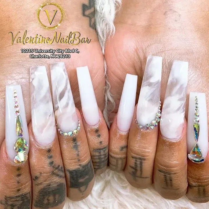 https://cdn.salonspotlight.com/photos/6yQNMSrIXJnrW09EDT9y/2a2c9387-970f-4fdc-b711-3ad850c06924_720x720