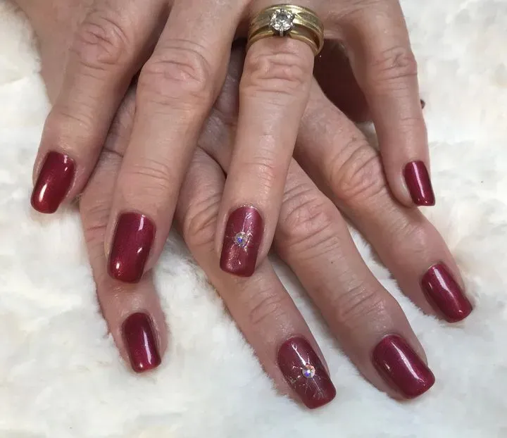https://cdn.salonspotlight.com/photos/7S4aMH5qXgGP5VOaTQfc/48548fe7-bc7b-4d0e-ba87-cba9f61bd6f2_720x720