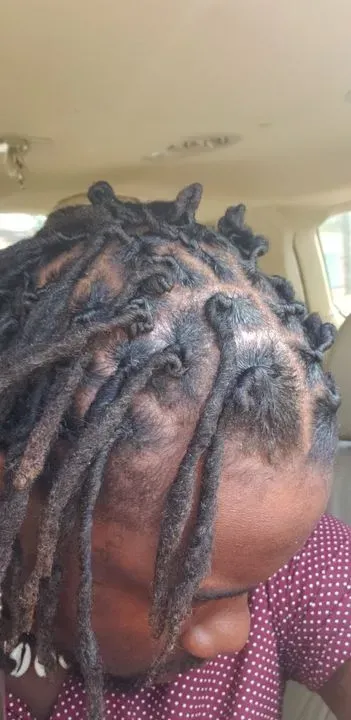 https://cdn.salonspotlight.com/photos/JrICzO1Ri065Y1bC2IqE/c641543e-80cf-459c-b205-eb7cd00825a9_720x720