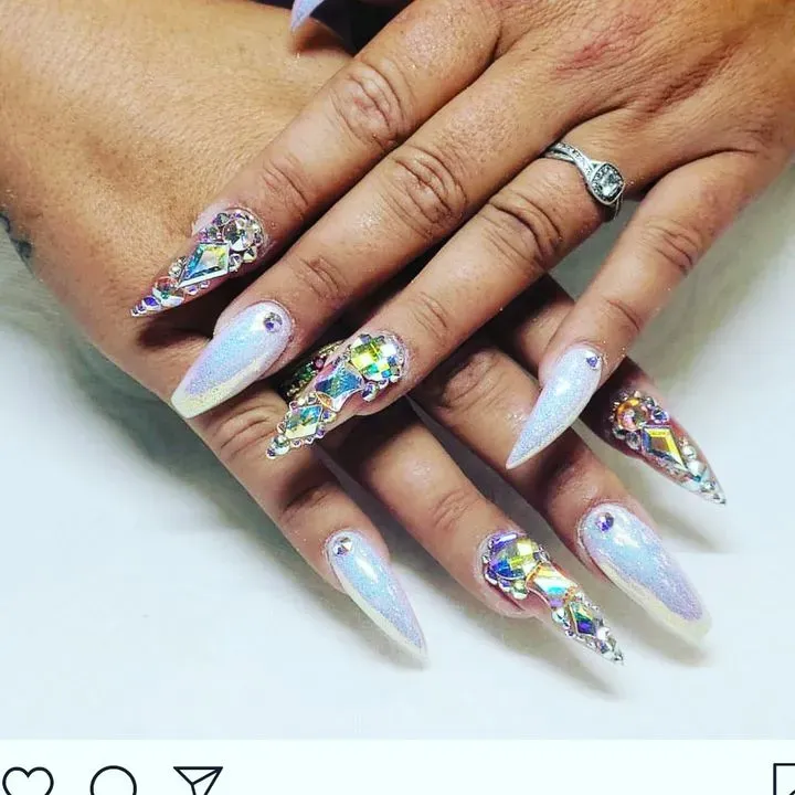 https://cdn.salonspotlight.com/photos/UMCPVntpck39RPyEh97b/a64f6a1a-f6ec-4dd9-86d8-7db5c0605151_720x720