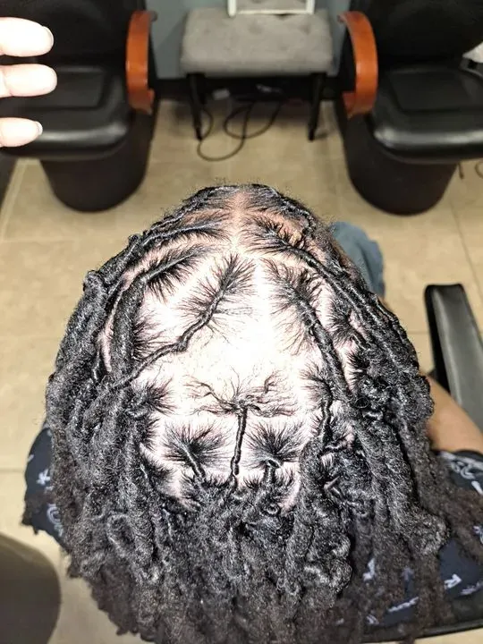 https://cdn.salonspotlight.com/photos/aGAJfaSv2M8ld2w7O3WF/6407186e-2a09-4124-9561-02b7e4e0b274_720x720