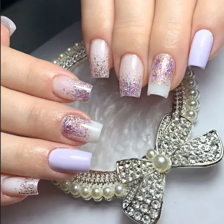 https://cdn.salonspotlight.com/photos/e4c3Bx1QkPecMFYPS6tX/64c83230-24fa-497c-bfaf-bfe128f415fc_720x720