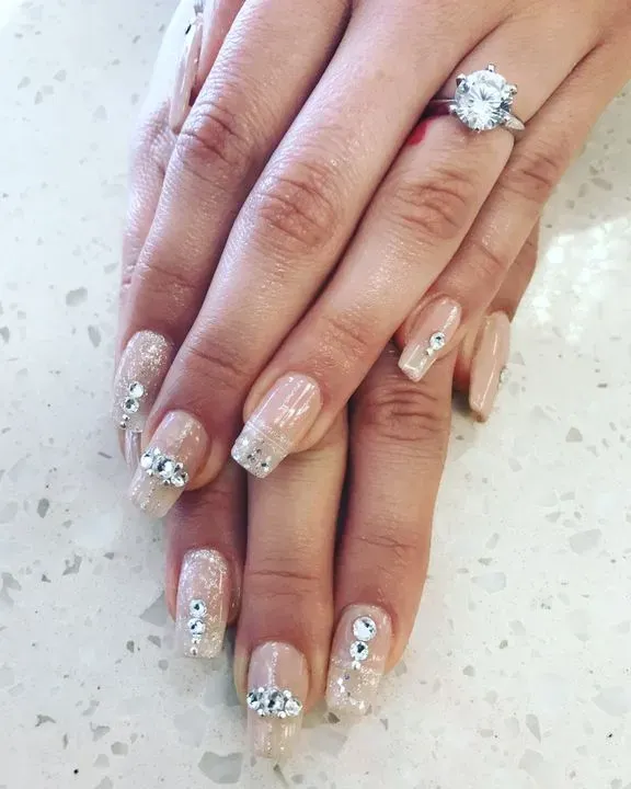 https://cdn.salonspotlight.com/photos/erkBpFRkrEL98yGYDi81/57897dc0-6c27-40dc-b30e-ef1488d4c07a_720x720